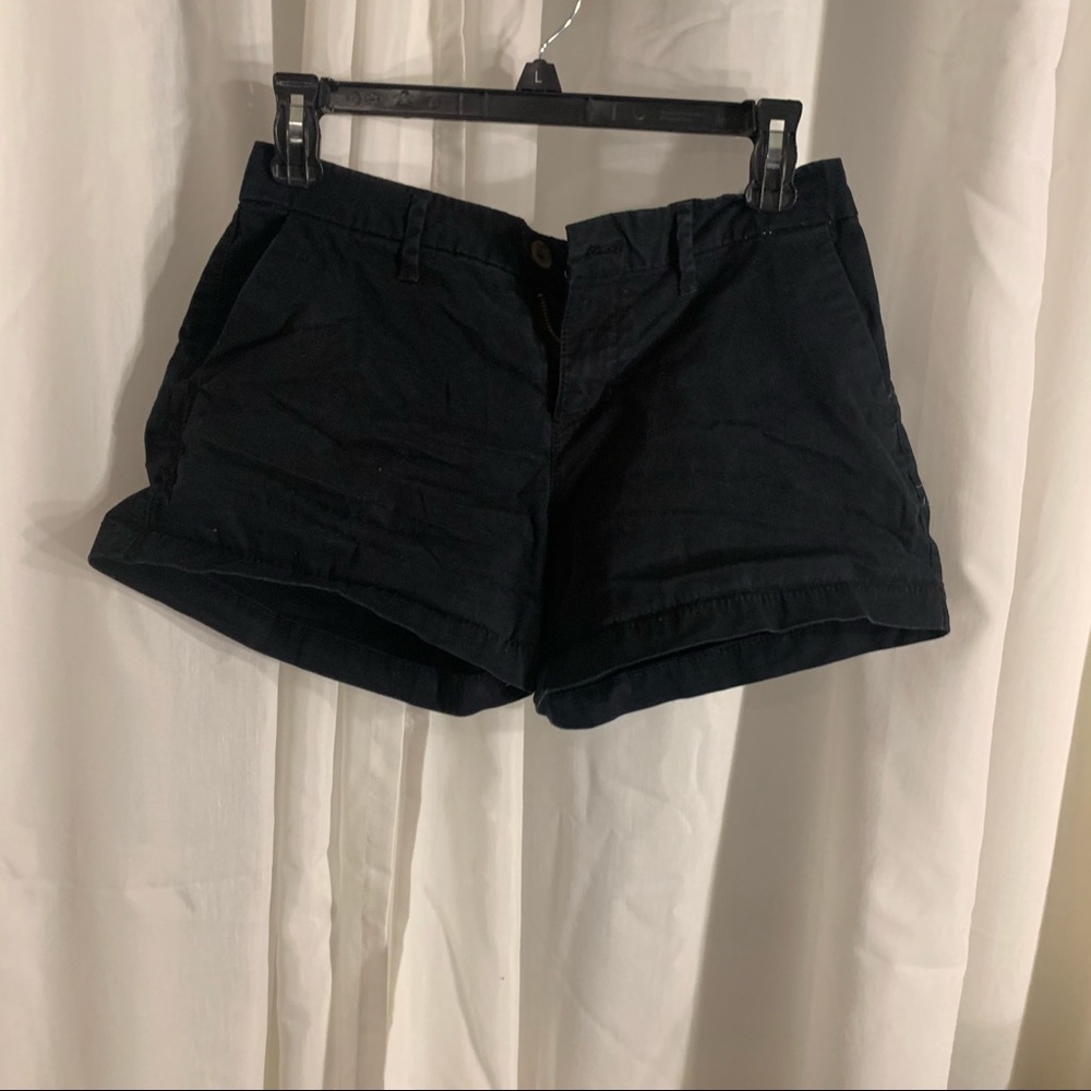 Two Pairs of Black & White Shorts
